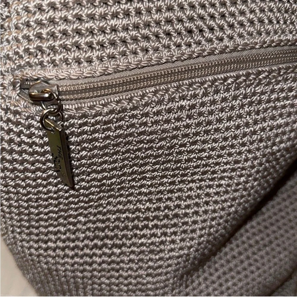 The Sak sling Backpack in the color mushroom